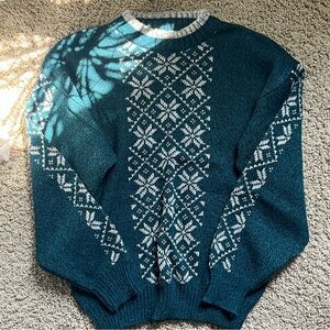 turquoise sweater with snowflake patterns